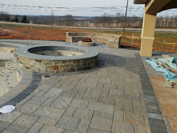 large back patio design around pool and hottub progress