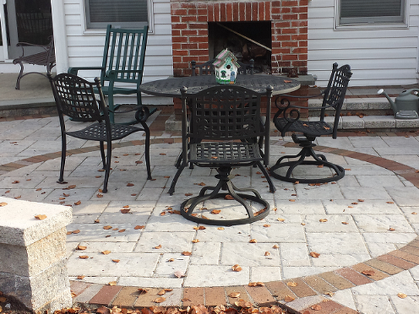 backyard patio along side pool and firepit