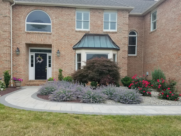 custom front walkway design with flowers 