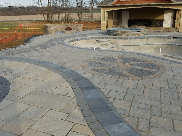 backyard patio with design, gazeboo, and firepit