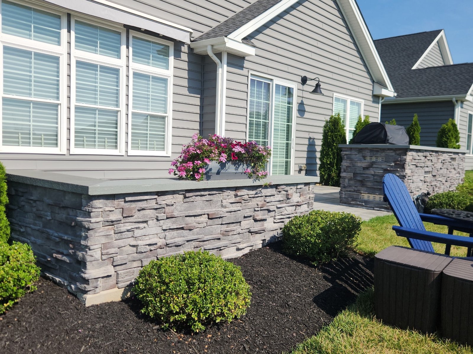 landscaping with plants next to retention wall